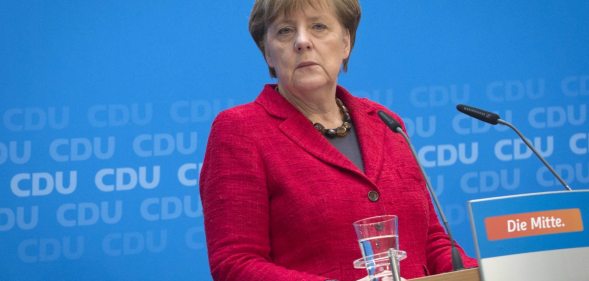 BERLIN, GERMANY - MARCH 14: German Chancellor and Chairwoman of the German Christian Democrats (CDU) Angela Merkel prepares to speak to the media following elections in three German states on March 14, 2016 in Berlin, Germany. Voters went to the polls yesterday in Rhineland-Palatinate, Saxony-Anhalt and Baden-Wuerttemberg and the right-leaning populist Alternative fuer Deutschland (Alternative for Germany,AfD) scored double-digit results in all three, dealing a blow to Germany's established parties, especially to the CDU. Merkel's liberal immigration policy towards migrants and refugees was a major issue in the elections and the AfD aimed its campaign at Germans who are uneasy with so many newcomers. (Photo by Axel Schmidt/Getty Images)