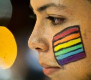 A Colombian LGBT community member takes part in a rally on June 15, 2016, in Cali, Colombia, in solidarity with the victims of the Orlando mass shooting. / AFP / LUIS ROBAYO (Photo credit should read LUIS ROBAYO/AFP/Getty Images)