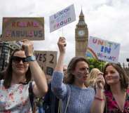Demonstrators hold placards duringa protest against the pro-Brexit outcome of the UK's June 23 referendum on the European Union (EU), in central London on June 25, 2016. The result of Britain's June 23 referendum vote to leave the European Union (EU) has pitted parents against children, cities against rural areas, north against south and university graduates against those with fewer qualifications. London, Scotland and Northern Ireland voted to remain in the EU but Wales and large swathes of England, particularly former industrial hubs in the north with many disaffected workers, backed a Brexit. / AFP / JUSTIN TALLIS (Photo credit should read JUSTIN TALLIS/AFP/Getty Images)