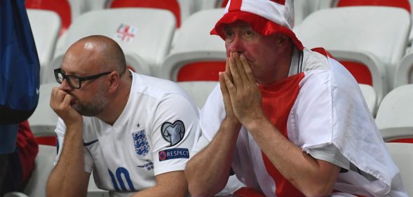 England supporters react after the Euro 2016 round of 16 football match between England and Iceland at the Allianz Riviera stadium in Nice on June 27, 2016. / AFP / ANNE-CHRISTINE POUJOULAT (Photo credit should read ANNE-CHRISTINE POUJOULAT/AFP/Getty Images)