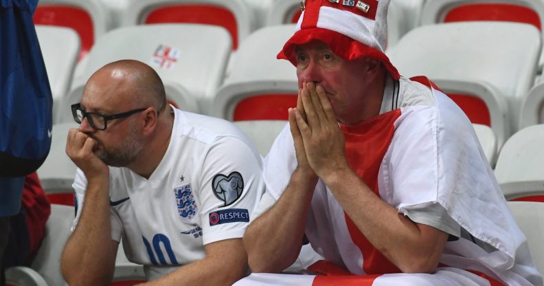 England supporters react after the Euro 2016 round of 16 football match between England and Iceland at the Allianz Riviera stadium in Nice on June 27, 2016. / AFP / ANNE-CHRISTINE POUJOULAT (Photo credit should read ANNE-CHRISTINE POUJOULAT/AFP/Getty Images)