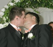 SYDNEY, NSW - NOVEMBER 25: Geoff Field (R) and Jason Kerr (L) kiss after marrying at Sydney's First Illegal Gay Wedding at Circular Quay November 25, 2005 in Sydney, Australia. (Photo by Stephane L'hostis/Getty Images)