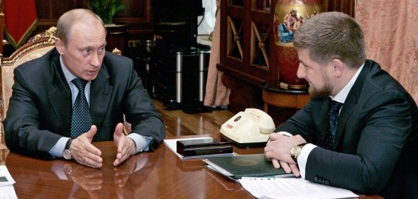 ST.PETERSBURG, RUSSIAN FEDERATION: Russian President Vladimir Putin (L) speaks to Chechen Prime Minister Ramzan Kadyrov during their meeting at the Kremlin in Moscow, 05 May 2006. The pro-Russian prime minister of Chechnya, Ramzan Kadyrov, said 02 May that his militia, accused of conducting a reign of terror, was being reassigned and placed under Russian command. "The structures no longer exist," the Itar-Tass news agency cited Kadyrov as saying about transferring responsibility for the militia which until now was part of the Chechen anti-terrorist unit. AFP PHOTO / ITAR-TASS / PRESIDENTIAL PRESS SERVICE (Photo credit should read SERGEI ZHUKOV/AFP/Getty Images)