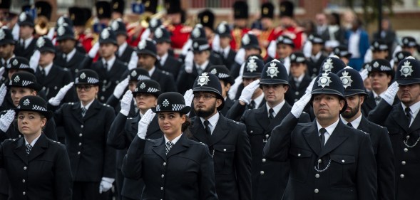 Met Police recruits take part in a parade at the end of their training