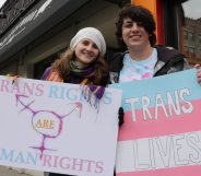 Transgender student Sorrel Rosin (R) poses with a friend February 25 2017 in Chicago as hundreds of transgender supporters protest against the Trump administration's reversal of federal protections of bathroom rights, warning it risked exposing young people to hate-fueled violence. Rosin, a high school student in Illinois, said Ive felt a spike in homophobia, transphobia, bigotry, misogyny in and out of school." / AFP / Derek R. HENKLE (Photo credit should read DEREK R. HENKLE/AFP/Getty Images)