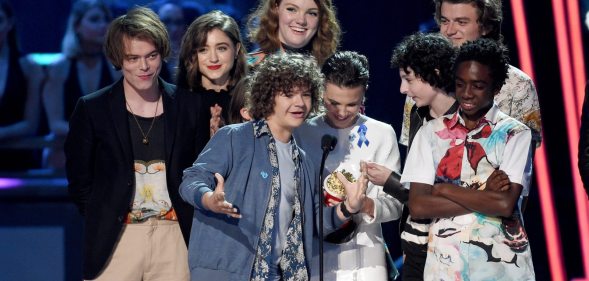 LOS ANGELES, CA - MAY 07: (L-R) Actors Gaten Matarazzo, Charlie Heaton, Noah Schnapp, Natalia Dyer, Shannon Purser, Millie Bobby Brown, Finn Wolfhard, Joe Keery, and Caleb McLaughlin accept the award for Show of the Year onstage during the 2017 MTV Movie And TV Awards at The Shrine Auditorium on May 7, 2017 in Los Angeles, California. (Photo by Kevork Djansezian/Getty Images)