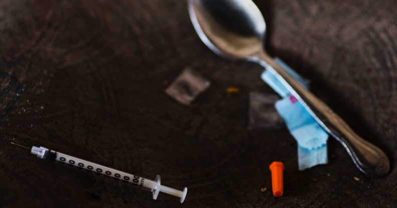 A needle, spoon, and narcotics bag are seen near a heroin encampment in the Kensington neighborhood of Philadelphia, Pennsylvania, on April 10, 2017. In North Philadelphia, railroad gulch as it is knowen, is ground zero in Philadelphia?s opioid epidemic. Known by locals as El Campanento, the open air drug market and heroin encampment is built with the discarded materials from the gulch and populated by addicts seeking a hit of heroin to keep their dope sick, or withdrawal symptoms, at bay. In one area, near the 2nd Avenue overpass, empty syringe wrappers blanket the refuse like grass the used needles they once contained poking through like thistles. According to the city Health Commission, Philadelphia is on track to see 33 percent more drug overdose deaths in 2017 over last year. / AFP PHOTO / DOMINICK REUTER (Photo credit should read DOMINICK REUTER/AFP/Getty Images)