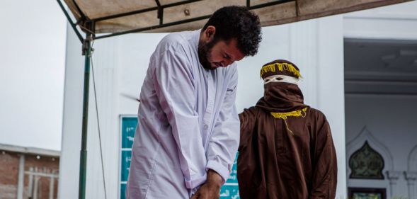 A man is lashed in Aceh for having gay sex