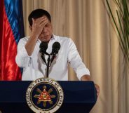 Philippine President Rodrigo Duterte gestures as he gives a speech during the mass oath taking of officials of various national leagues at the Malacanang Palace in Manila on June 1, 2017. Philippine airstrikes aimed at Islamist militants who are holding hostages as human shields in a southern city killed 11 soldiers, authorities said on June 1, as they conceded hundreds of gunmen may have escaped a blockade. / AFP PHOTO / NOEL CELIS (Photo credit should read NOEL CELIS/AFP/Getty Images)