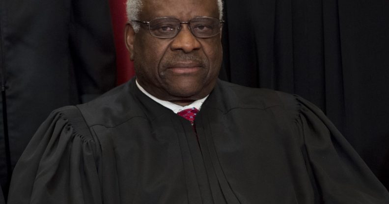 US Supreme Court Associate Justice Clarence Thomas sits for an official photo with other members of the US Supreme Court in the Supreme Court in Washington, DC, June 1, 2017. / AFP PHOTO / SAUL LOEB (Photo credit should read SAUL LOEB/AFP/Getty Images)