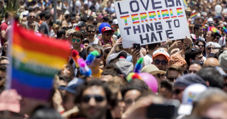TOPSHOT - Participants take part in the annual Gay Pride parade in the Israeli city of Tel Aviv, on June 9, 2017. Tens of thousands of revellers from Israel and abroad packed the streets of Tel Aviv for the city's annual Gay Pride march, billed as the Middle East's biggest. / AFP PHOTO / JACK GUEZ (Photo credit should read JACK GUEZ/AFP/Getty Images)