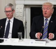 WASHINGTON, DC - JUNE 19: Apple CEO Tim Cook listens to U.S. President Donald Trump deliver opening remarks during a meeting of the American Technology Council in the State Dining Room of the White House June 19, 2017 in Washington, DC. According to the White House, the council's goal is "to explore how to transform and modernize government information technology." (Photo by Chip Somodevilla/Getty Images)