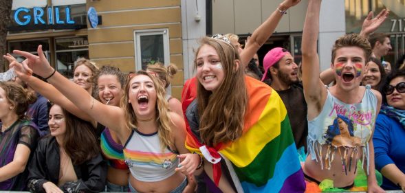 Ciara Hall (L) cheers with friends during the San Francisco Pride parade in San Francisco, California on Sunday, June, 25, 2017. / AFP PHOTO / Josh Edelson (Photo credit should read JOSH EDELSON/AFP/Getty Images)