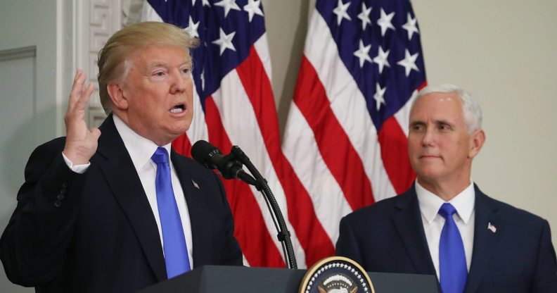 WASHINGTON, DC - JULY 19: U.S. President Donald Trump speaks while flanked by US Vice President Mike Pence during the first meeting of the Presidential Advisory Commission on Election Integrity in the Eisenhower Executive Office Building, on July 19, 2017 in Washington, DC. (Photo by Mark Wilson/Getty Images)