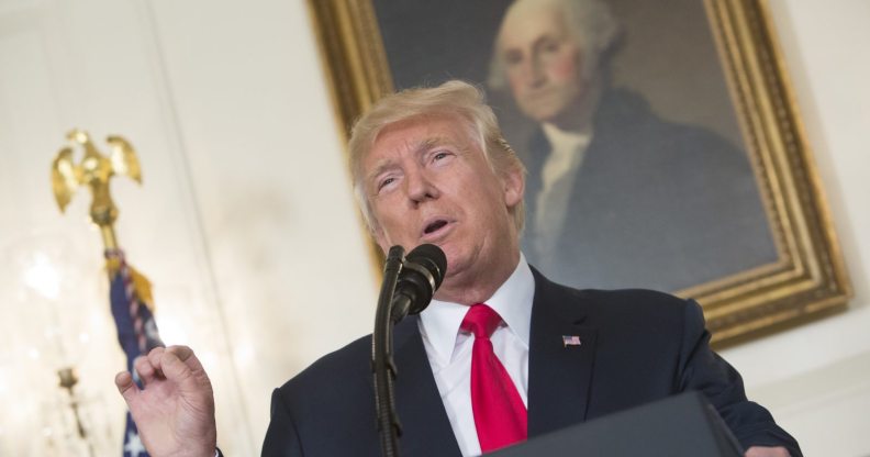 WASHINGTON, D.C. - AUGUST 14: (AFP-OUT) U.S. President Donald Trump makes a statement on the violence this past weekend in Charlottesville, Virginia at the White House on August 14, 2017 in Washington, DC. Heather Heyer, 32, was killed in Charlottesville when a car allegedly driven by James Alex Fields Jr. barreled into a crowd of counter-protesters following violence at the 'Unite the Right' rally. Two Virginia state police troopers were also killed when their helicopter crashed while covering events on the ground. (Photo by Chris Kleponis-Pool/Getty Images)