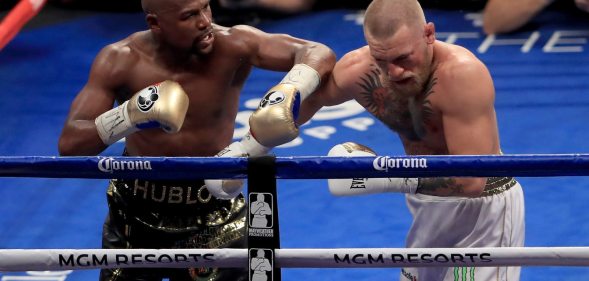 Mayweather punches McGregor