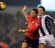 Manchester United's Portuguese midfielder Cristiano Ronaldo (L) vies with West Bromwich Albion's Belgium defender Carl Hoefkens during the English Premier league football match at The Hawthorns, West Bromwich, central England, on January 27, 2009. AFP PHOTO/ANDREW YATES FOR EDITORIAL USE ONLY Additional licence required for any commercial/promotional use or use on TV or internet (except identical online version of newspaper) of Premier League/Football League photos. Tel DataCo +44 207 2981656. Do not alter/modify photo. (Photo credit should read ANDREW YATES/AFP/Getty Images)