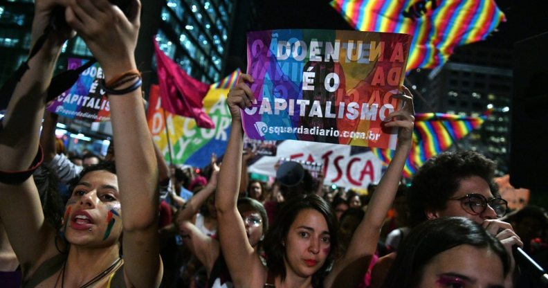 People protest against the decision of a Brazilian judge who approved gay conversion therapy in Sao Paulo, Brazil on September 22, 2017. Brazilian federal judge Waldemar de Carvalho overruled a 1999 decision by the Federal Council of Psychology that forbade psychologists from offering widely discredited treatments which claims to cure gay people. / AFP PHOTO / NELSON ALMEIDA (Photo credit should read NELSON ALMEIDA/AFP/Getty Images)