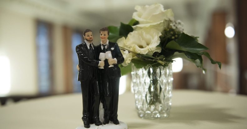 BERLIN, GERMANY - OCTOBER 01: Same sex wedding figures stand on a table after the first wedding after new law 'Ehe fuer alle' (wedding for everyone) in Germany at Schoeneberg district townhall on October 1, 2017 in Berlin, Germany.(Photo by Steffi Loos/Getty Images)