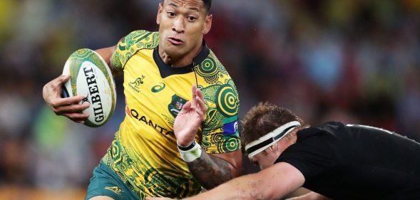 BRISBANE, AUSTRALIA - OCTOBER 21: Israel Folau of the Wallabies is tackled during the Bledisloe Cup match between the Australian Wallabies and the New Zealand All Blacks at Suncorp Stadium on October 21, 2017 in Brisbane, Australia. (Photo by Matt King/Getty Images)
