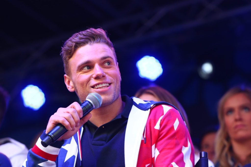 NEW YORK, NY - NOVEMBER 01: skier Gus Kenworthy speaks during the 100 Days Out 2018 PyeongChang Winter Olympics Celebration - Team USA in Times Square on November 1, 2017 in New York City. (Photo by Mike Stobe/Getty Images for USOC)