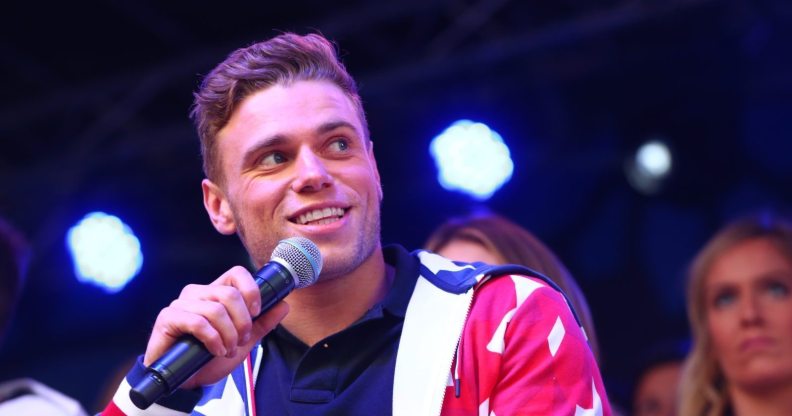 NEW YORK, NY - NOVEMBER 01: skier Gus Kenworthy speaks during the 100 Days Out 2018 PyeongChang Winter Olympics Celebration - Team USA in Times Square on November 1, 2017 in New York City. (Photo by Mike Stobe/Getty Images for USOC)