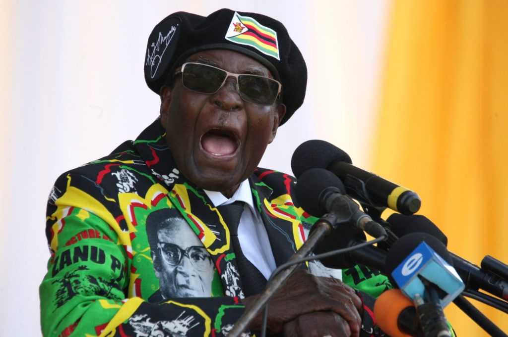 Zimbabwe's President Robert Mugabe delivers a speech during the Zimbabwe ruling party Zimbabwe African National Union- Patriotic Front (Zanu PF) youth interface Rally on November 4, 2017 in Bulawayo. / AFP PHOTO / ZINYANGE AUNTONY (Photo credit should read ZINYANGE AUNTONY/AFP/Getty Images)