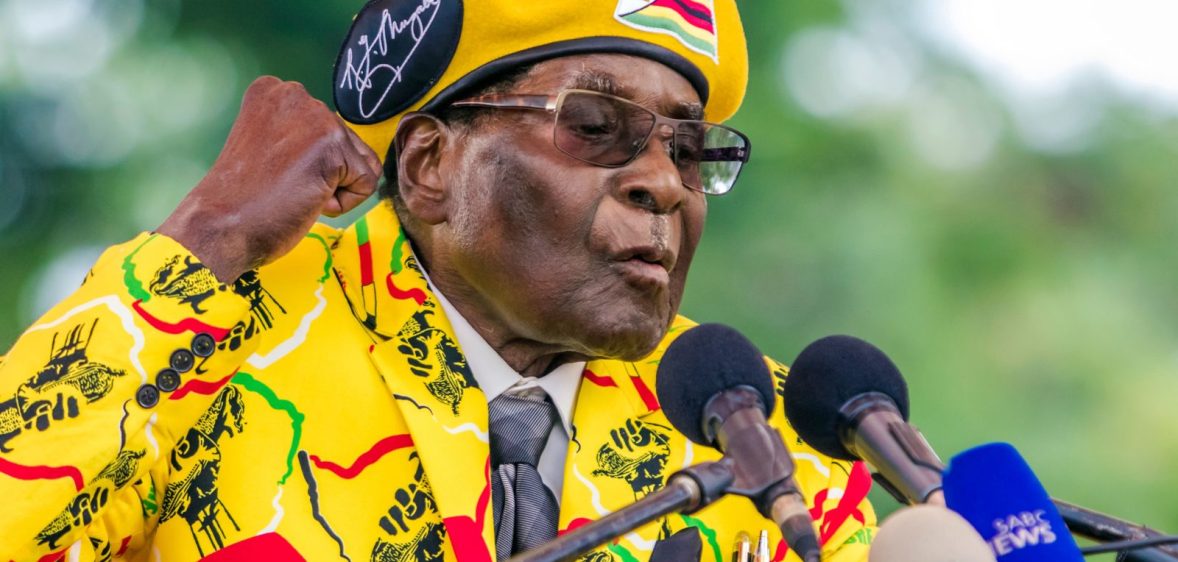Zimbabwe's President Robert Mugabe addresses party members and supporters gathered at his party headquarters to show support to Grace Mugabe becoming the party's next Vice President after the dismissal of Emerson Mnangagwa November 8 2017. Zimbabwe's sacked vice president, Emmerson Mnangagwa, said on November 8, 2017, he had fled the country, as he issued a direct challenge to long-ruling President Robert Mugabe and his wife Grace. / AFP PHOTO / Jekesai NJIKIZANA (Photo credit should read JEKESAI NJIKIZANA/AFP/Getty Images)