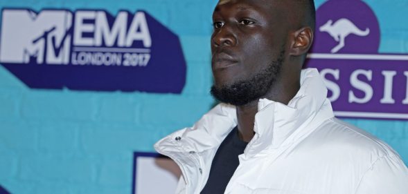 LONDON, ENGLAND - NOVEMBER 12: Rapper Stormzy attends the MTV EMAs 2017 held at The SSE Arena, Wembley on November 12, 2017 in London, England. (Photo by Andreas Rentz/Getty Images for MTV)
