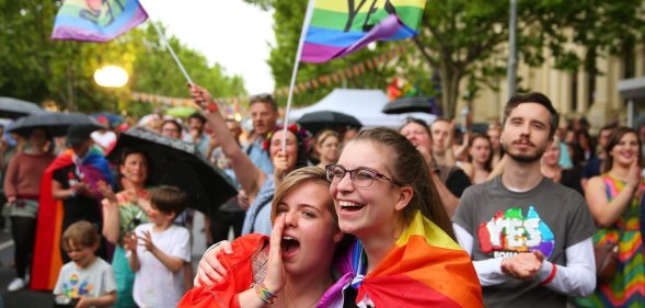 MELBOURNE, AUSTRALIA - NOVEMBER 15: Supporters of the 'Yes' vote for marriage equality celebrate at Melbourne's Result Street Party on November 15, 2017 in Melbourne, Australia. Australians have voted for marriage laws to be changed to allow same-sex marriage, with the Yes vote claiming 61.6% to to 38.4% for No vote. Despite the Yes victory, the outcome of Australian Marriage Law Postal Survey is not binding, and the process to change current laws will move to the Australian Parliament in Canberra. (Photo by Scott Barbour/Getty Images)
