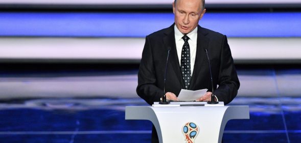 Russian President Vladimir Putin speaks prior to the start of the Final Draw for the 2018 FIFA World Cup football tournament (MLADEN ANTONOV/AFP/Getty Images)