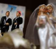 Wedding cake figures of a gay and lesbian married couples