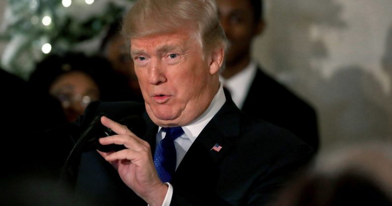 WASHINGTON, DC - DECEMBER 13: U.S. President Donald Trump speaks about tax reform in the Cross Hall at the White House on December 13, 2017 in Washington, DC. House and Senate Republicans are working on a tentative deal on tax reform that will overhaul the U.S. tax system. (Photo by Mark Wilson/Getty Images)