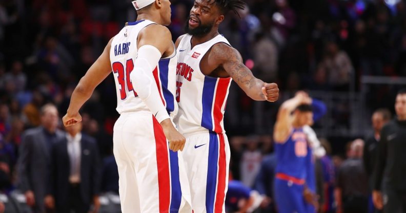 DETROIT, MI - DECEMBER 22: Reggie Bullock #25 of the Detroit Pistons celebrates a 104-101 win over the New York Knicks with Tobias Harris #34 at Little Caesars Arena on December 22, 2017 in Detroit, Michigan. NOTE TO USER: User expressly acknowledges and agrees that, by downloading and or using this photograph, User is consenting to the terms and conditions of the Getty Images License Agreement. (Photo by Gregory Shamus/Getty Images)