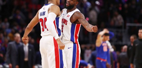 DETROIT, MI - DECEMBER 22: Reggie Bullock #25 of the Detroit Pistons celebrates a 104-101 win over the New York Knicks with Tobias Harris #34 at Little Caesars Arena on December 22, 2017 in Detroit, Michigan. NOTE TO USER: User expressly acknowledges and agrees that, by downloading and or using this photograph, User is consenting to the terms and conditions of the Getty Images License Agreement. (Photo by Gregory Shamus/Getty Images)