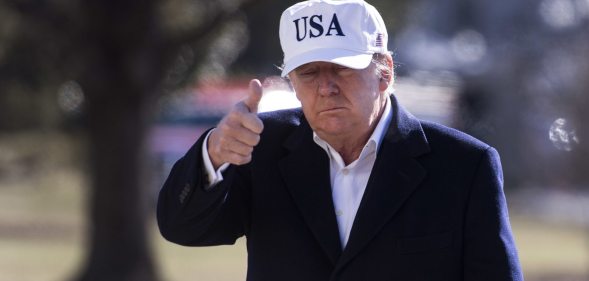 WASHINGTON, DC - JANUARY 7: (AFP OUT) U.S. President Donald Trump returns to the White House following a weekend trip with Republican leadership and members of his cabinet at Camp David, on January 7, 2018 in Washington, D.C. (Photo by Kevin Dietsch-Pool/Getty Images)