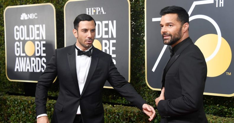 Ricky Martin (R) and Jwan Yosef attend The 75th Annual Golden Globe Awards (Photo by Frazer Harrison/Getty Images)