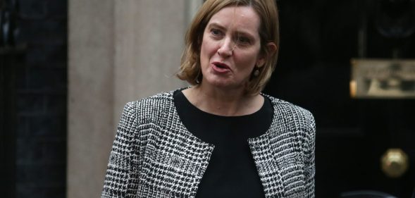 Britain's Home Secretary Amber Rudd leaves 10 Downing street in London on January 8, 2018. British Prime Minister Theresa May began a major reshuffle of her cabinet by replacing the chairman of her Conservative Party, ahead of more ministerial changes expected later today. / AFP PHOTO / Daniel LEAL-OLIVAS (Photo credit should read DANIEL LEAL-OLIVAS/AFP/Getty Images)