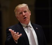 US President Donald Trump speaks to reporters at Trump International Golf Club in West Palm Beach on January 14, 2018. / AFP PHOTO / Nicholas Kamm (Photo credit should read NICHOLAS KAMM/AFP/Getty Images)