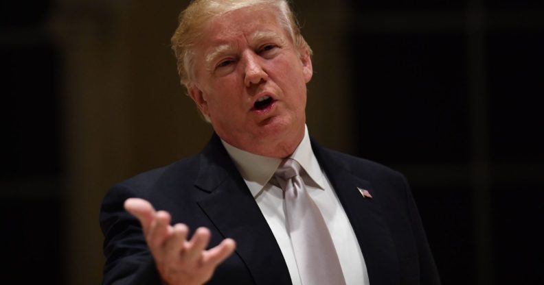 US President Donald Trump speaks to reporters at Trump International Golf Club in West Palm Beach on January 14, 2018. / AFP PHOTO / Nicholas Kamm (Photo credit should read NICHOLAS KAMM/AFP/Getty Images)