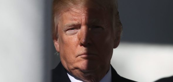 WASHINGTON, DC - JANUARY 19: U.S. President Donald Trump stands in the colonnade as he is introduced to speak to March for Life participants and pro-life leaders in the Rose Garden at the White House on January 19, 2018 in Washington, DC. The annual march takes place around the anniversary of Roe v. Wade, Supreme Court decision that came on January 22, 1974. (Photo by Mark Wilson/Getty Images)
