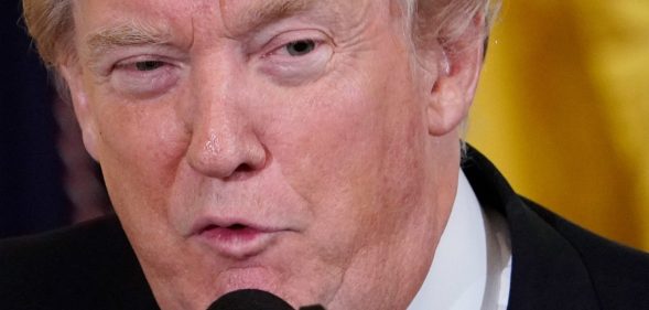 US President Donald Trump speaks during a working session with mayors in the East Room of the White House on January 24, 2018 in Washington, DC. / AFP PHOTO / Mandel NGAN (Photo credit should read MANDEL NGAN/AFP/Getty Images)