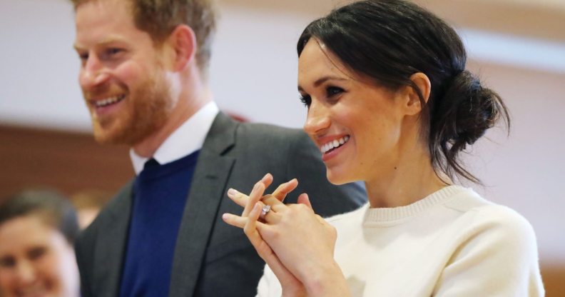 BELFAST, NORTHERN IRELAND - MARCH 23: Prince Harry and Meghan Markle during a visit to Catalyst Inc science park in Belfast where they met some of Northern Ireland's brightest young entrepreneurs on March 23, 2018 in Belfast, Nothern Ireland. (Photo by Niall Carson - Pool/Getty Images)