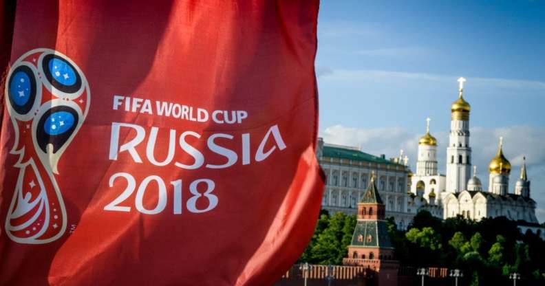 A photograph taken on May 30, 2018 shows the FIFA World Cup 2018 flag in front of the Kremlin in Moscow. - The FIFA World Cup 2018 tournament kicks off on June 14, 2018. (Photo by Mladen ANTONOV / AFP) (Photo credit should read MLADEN ANTONOV/AFP/Getty Images)