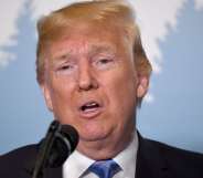 US President Donald Trump speaks to reporters on June 9, 2018, during the G7 Summit in La Malbaie, Quebec, Canada. (Photo by SAUL LOEB / AFP) (Photo credit should read SAUL LOEB/AFP/Getty Images)