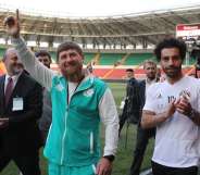 Egyptian national team football player and Liverpool's star striker Mohamed Salah (R) and head of the Chechen Republic Ramzan Kadyrov pose during a training of Egyptian team at the Akhmat Arena stadium in Grozny on June 10, 2018, ahead of the Russia 2018 World Cup. - Egypt's national football team will use the venue as their base camp training site. (Photo by KARIM JAAFAR / AFP) (Photo credit should read KARIM JAAFAR/AFP/Getty Images)
