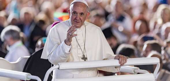 Pope Francis greets the crowd before celebrating a mass during the ecumenical meeting at the World Council of Churches (WCC) at Palexpo hall in Geneva, on June 21, 2018. - Pope Francis visits the World Council of Churches on 21 June as centrepiece of the ecumenical commemoration of the WCC's 70th anniversary. (Photo by MARTIAL TREZZINI / POOL / AFP) (Photo credit should read MARTIAL TREZZINI/AFP/Getty Images)