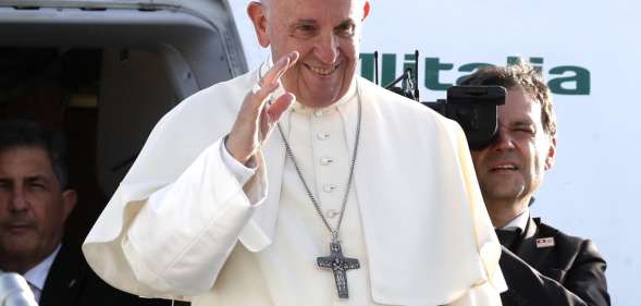 Pope Francis waves as he leaves at Cointrin airport in Geneva, on June 21 2018 after a one-day visit at the invitation of the World Council of Churches (WWC). - Pope Francis visited the World Council of Churches on 21 June as centrepiece of the ecumenical commemoration of the WCC's 70th anniversary. (Photo by DENIS BALIBOUSE / POOL / AFP) (Photo credit should read DENIS BALIBOUSE/AFP/Getty Images)