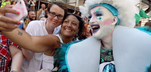 LONDON, ENGLAND - JULY 07: Parade goers during Pride In London on July 7, 2018 in London, England. It is estimated over 1 million people will take to the streets and approximately 30,000 people and 472 organisations will join the annual parade, which is one of the world's biggest LGBT+ celebrations. (