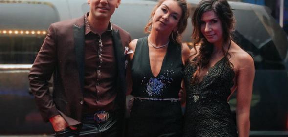 Gretchen Wilson (middle) and her "gusband" Chad Laboy (left)